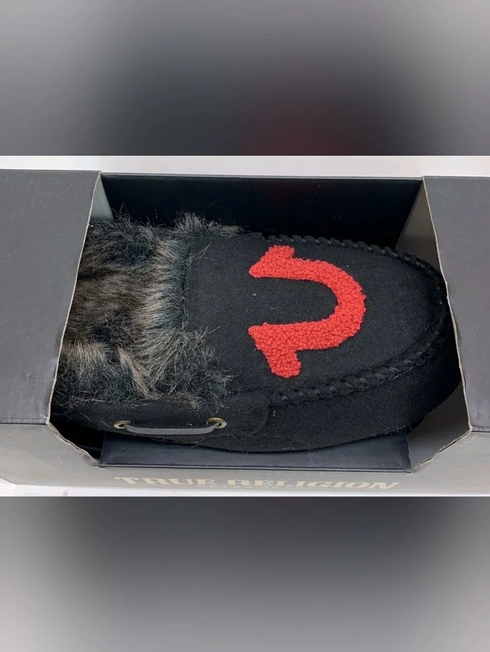 True Religion Black Faux Fur Moccasin Slipper with Red Logo